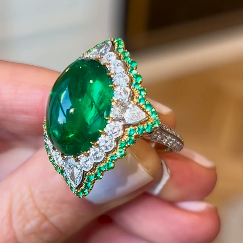 13.35ct Oval Cabochon Emerald Set Within A White Sapphire Surround Handmade Ring