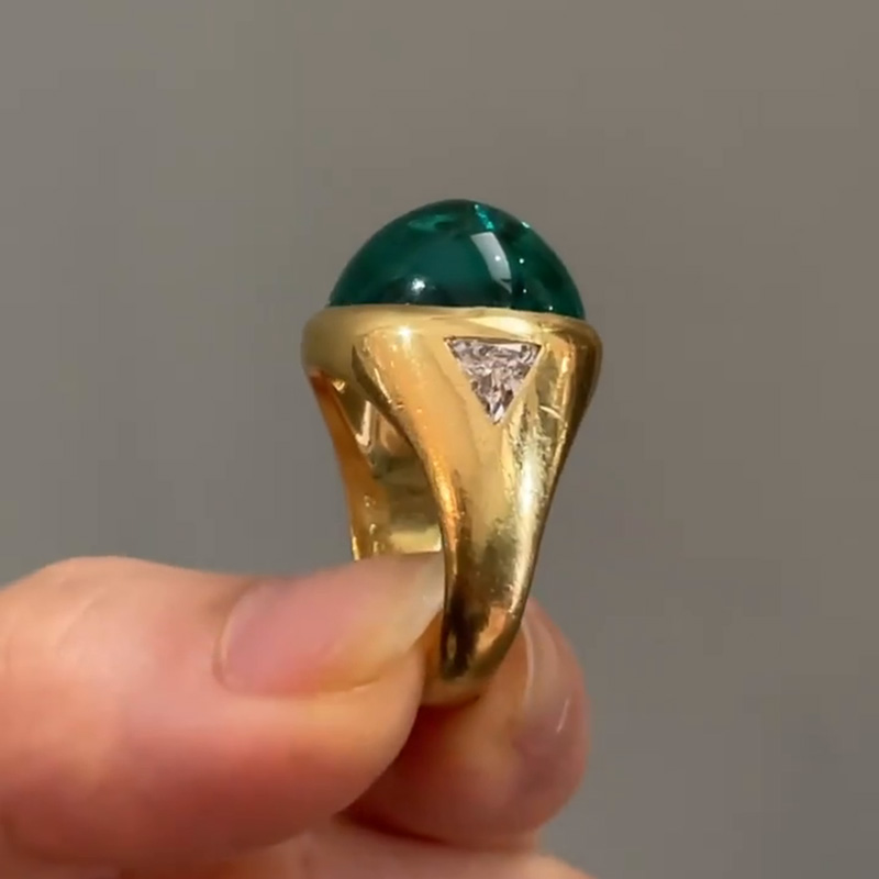 9.5ct Cabochon Emerald With with Triangular Cut White Sapphire Shoulders Yellow Gold Ring