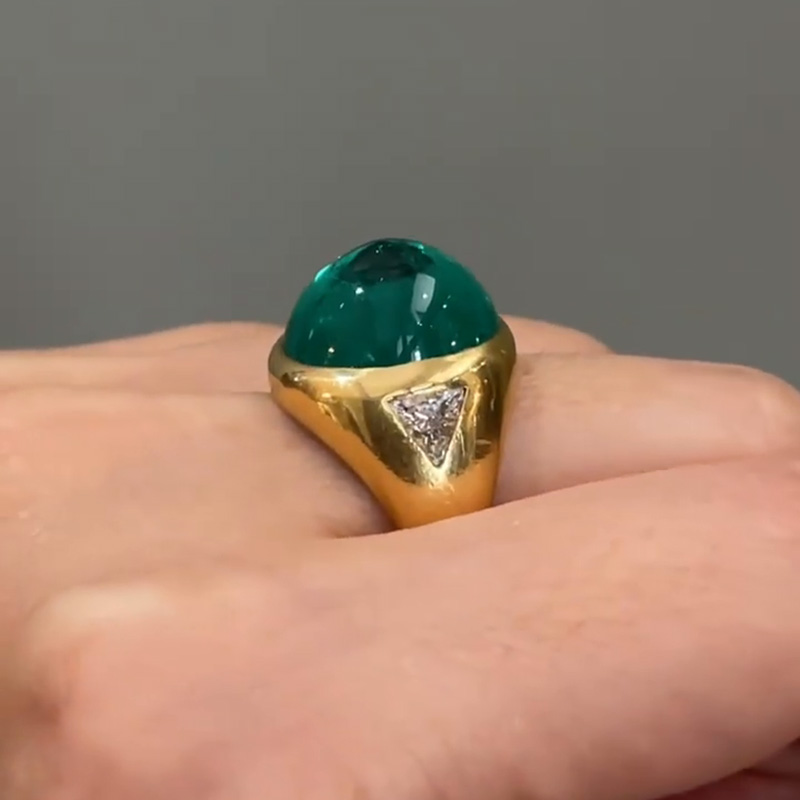 9.5ct Cabochon Emerald With with Triangular Cut White Sapphire Shoulders Yellow Gold Ring