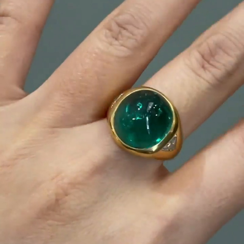 9.5ct Cabochon Emerald With with Triangular Cut White Sapphire Shoulders Yellow Gold Ring