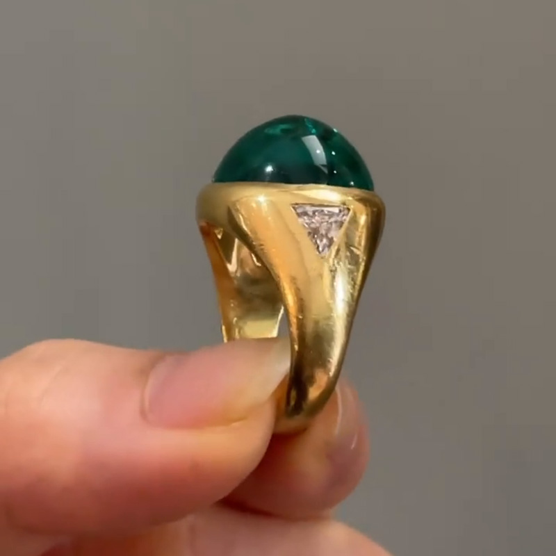 9.5ct Cabochon Emerald With with Triangular Cut White Sapphire Shoulders Yellow Gold Ring