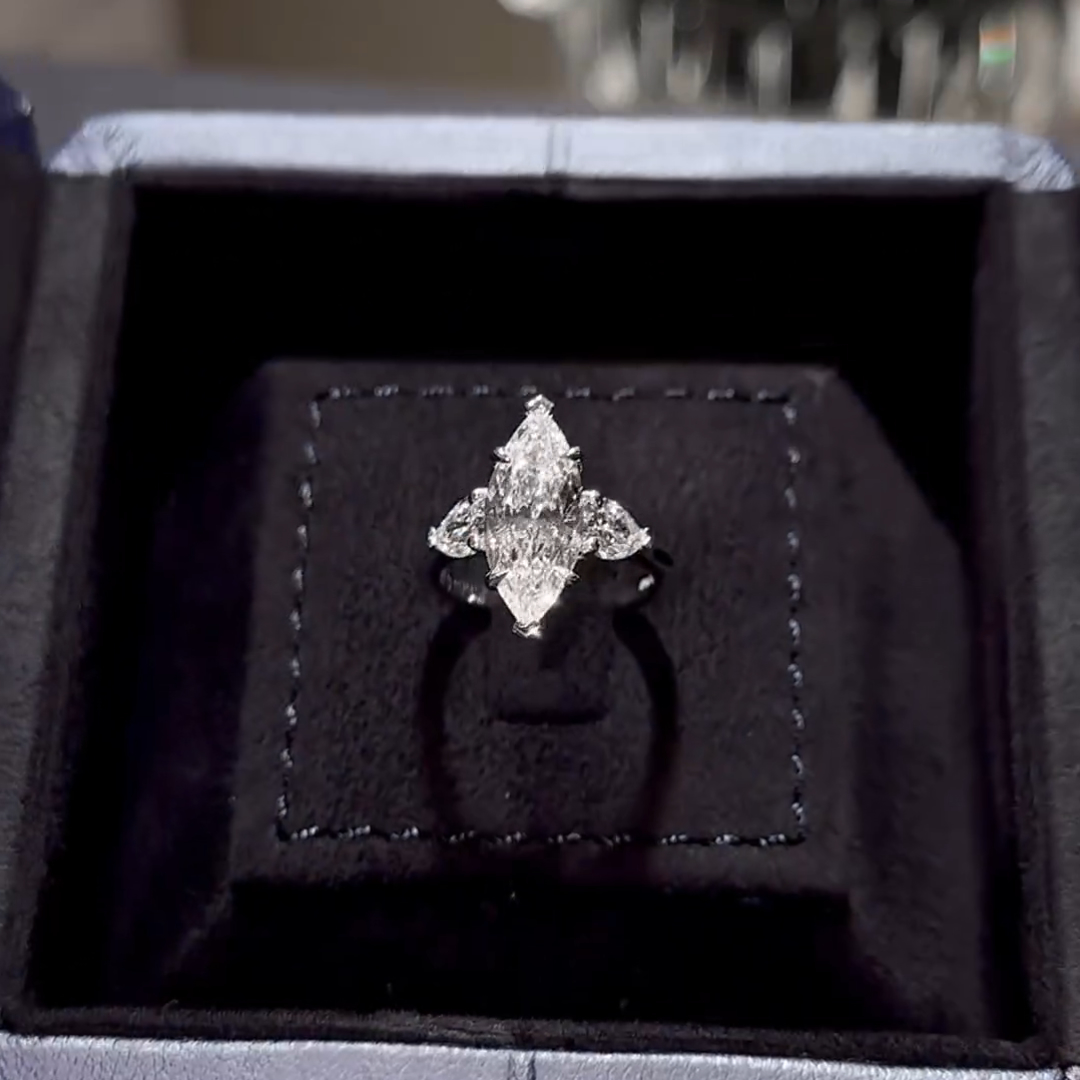 3ct Marquise Cut White Sapphire With Heart Shaped Side Stone Sterling Silver Engagement Ring