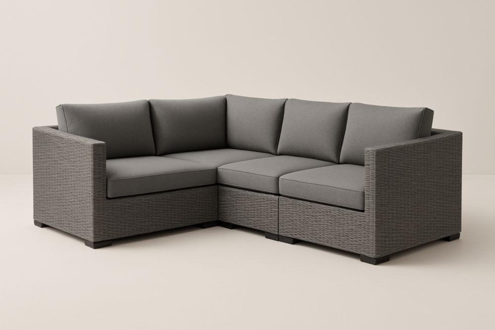 Divano angolare modulare da giardino in rattan grigio con cuscini in poliestere