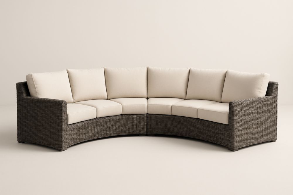 Divano angolare da giardino in rattan sintetico con cuscini beige