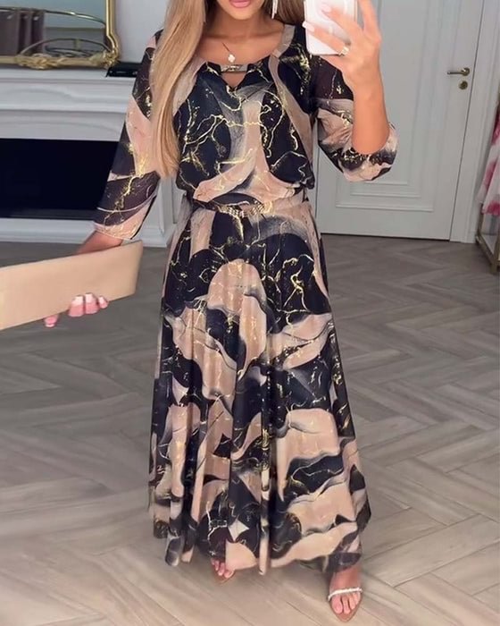 Elegantné šifónové šaty s potlačou a trojštvrťovými rukávmi