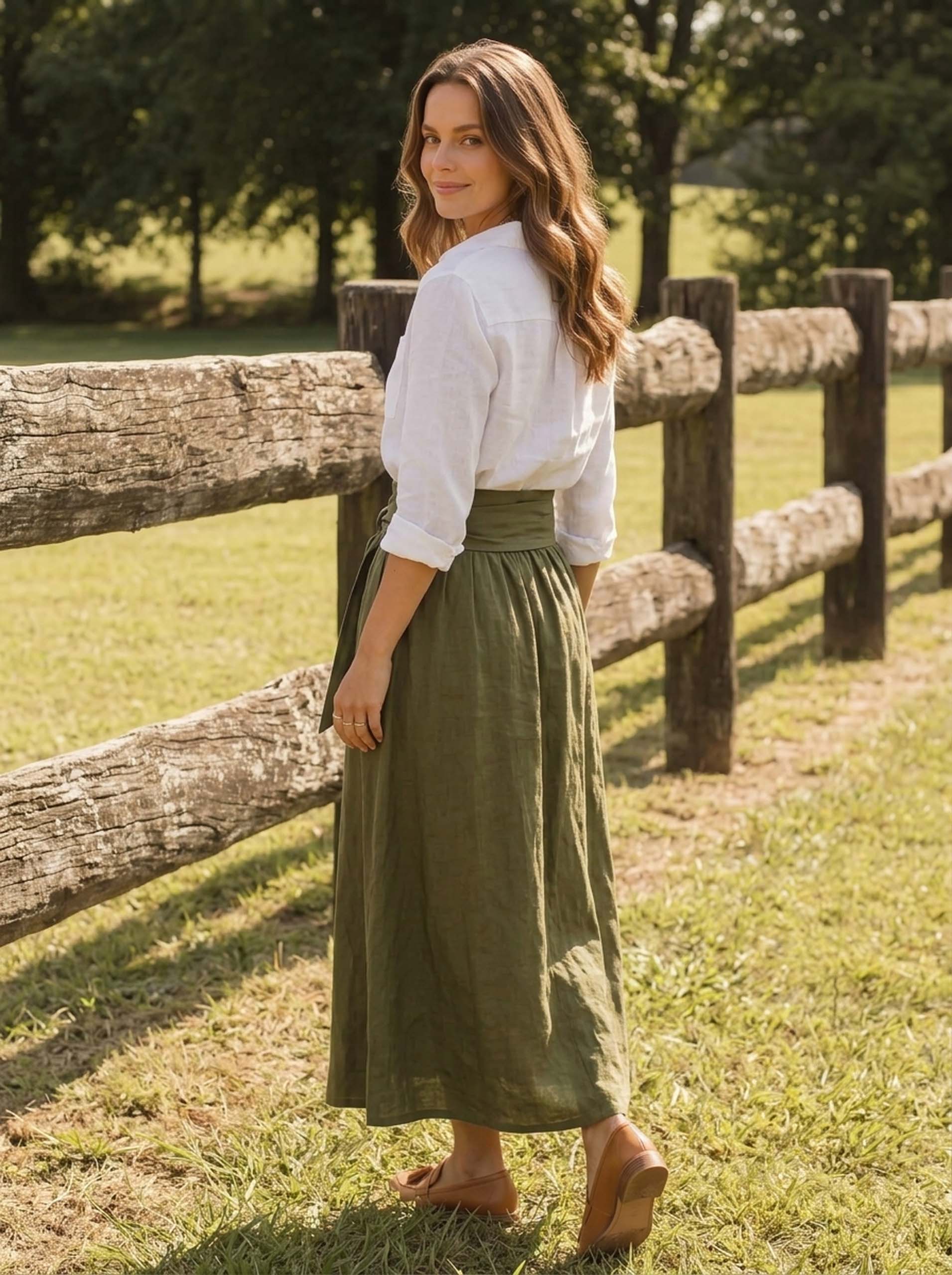 Side view of white blouse and olive tie-waist maxi skirt