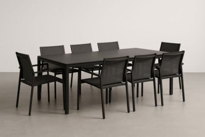 Ensemble table en aluminium noir avec 8 chaises en textile