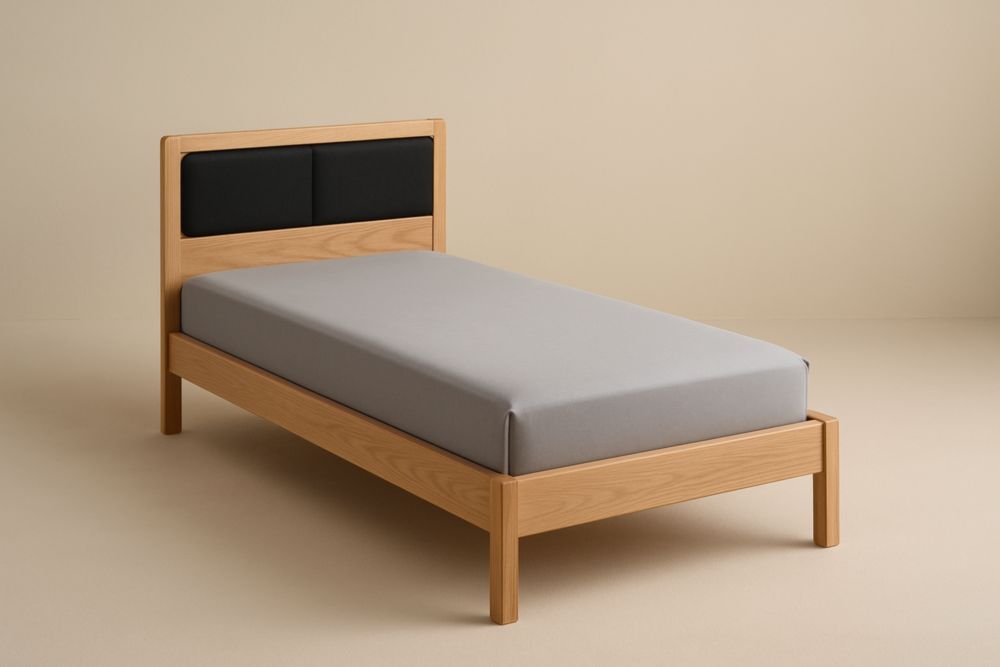 Letto singolo in legno massello con testiera imbottita nero e struttura naturale