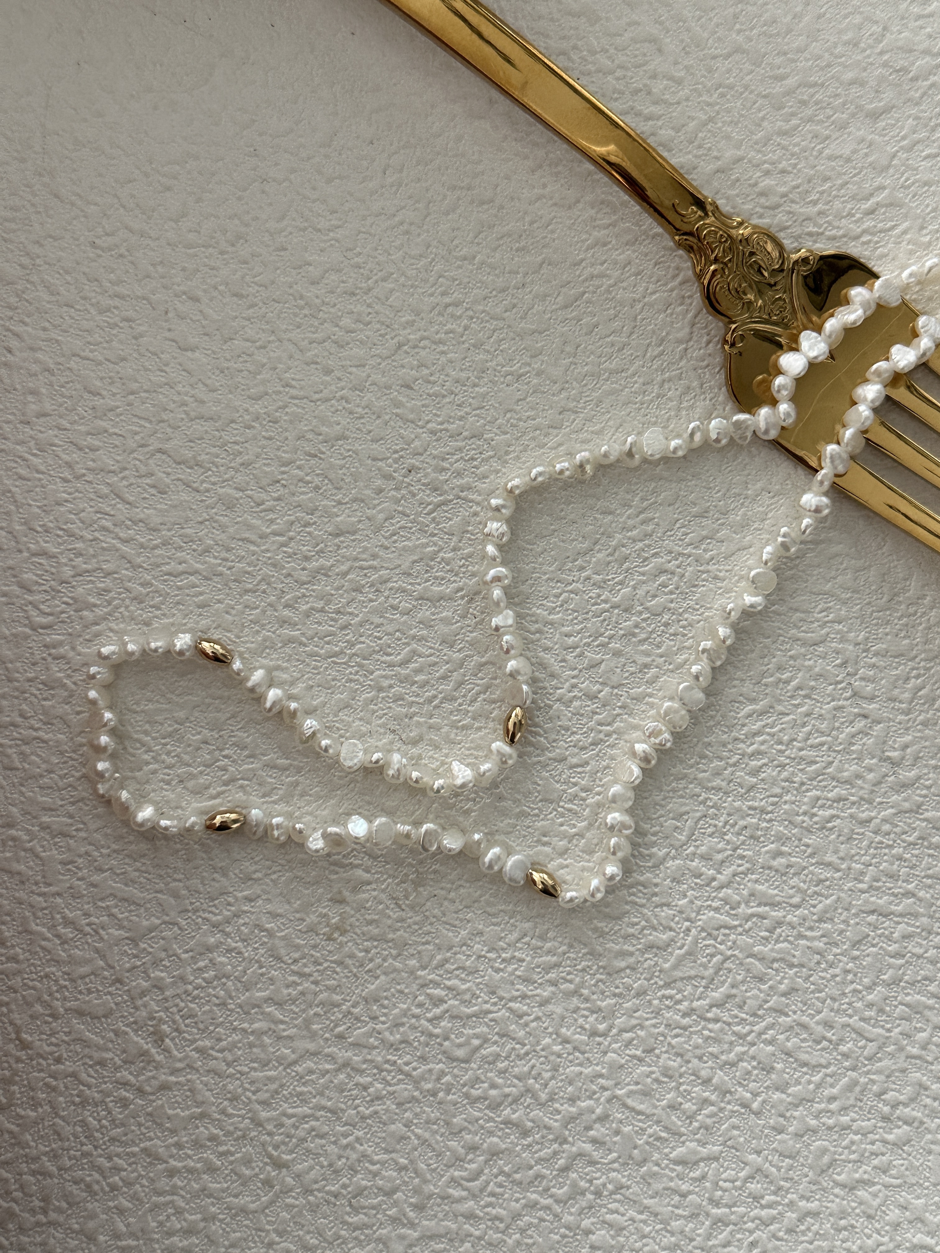 Mini baby gold bead necklace