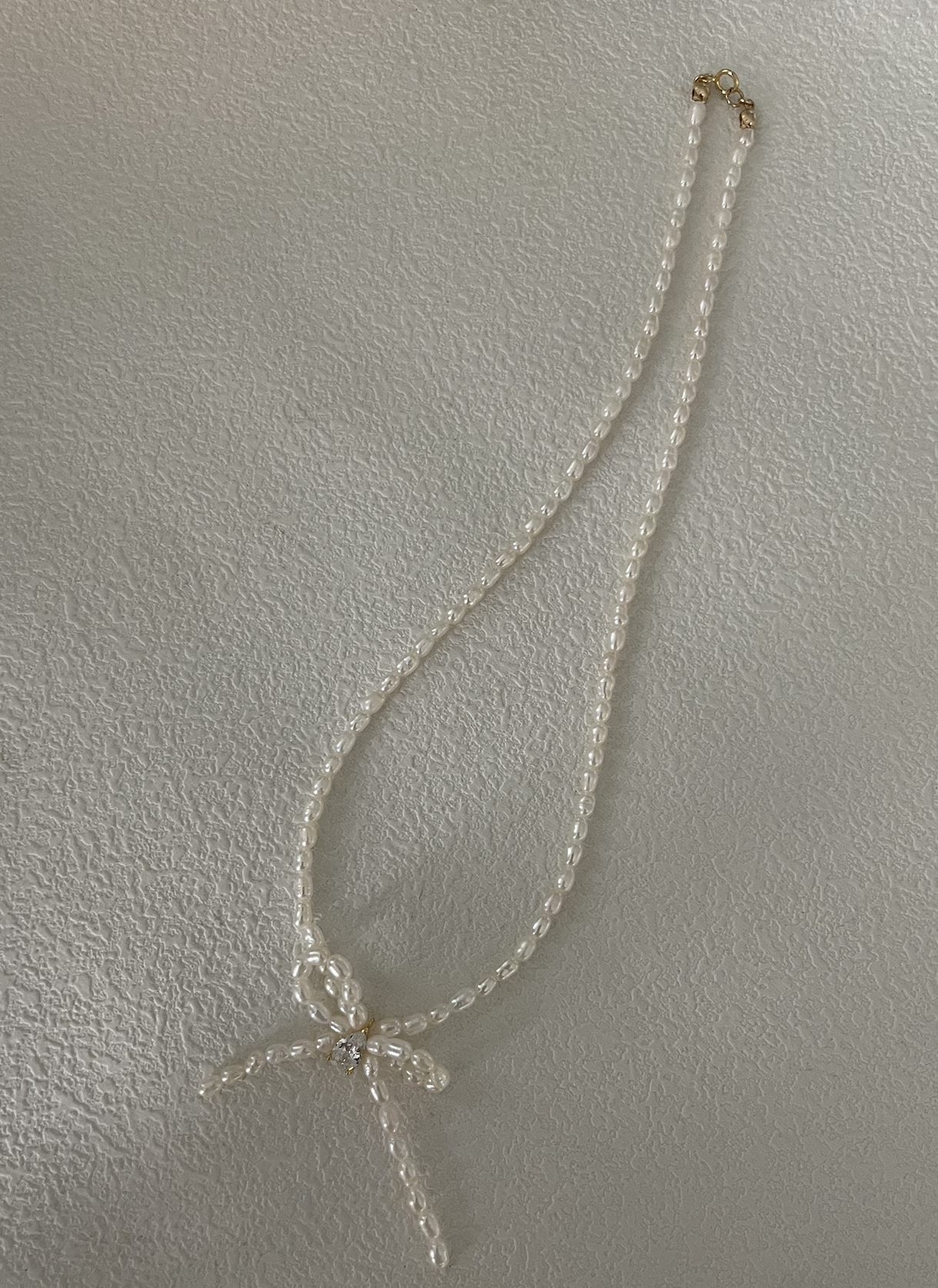 Rice grain bowknot necklace