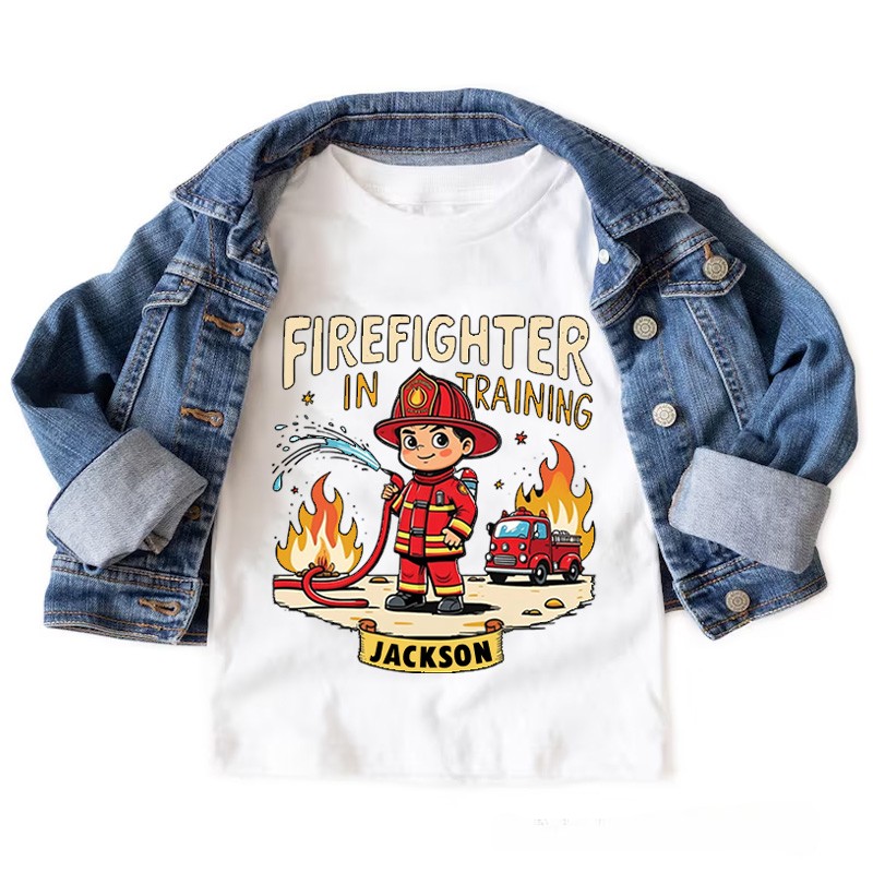 Personalized Firefighter in Training Kids T-Shirt with Custom Name and Cute Cartoon Firefighter Graphic for Aspiring Heroes Kids T-Shirt