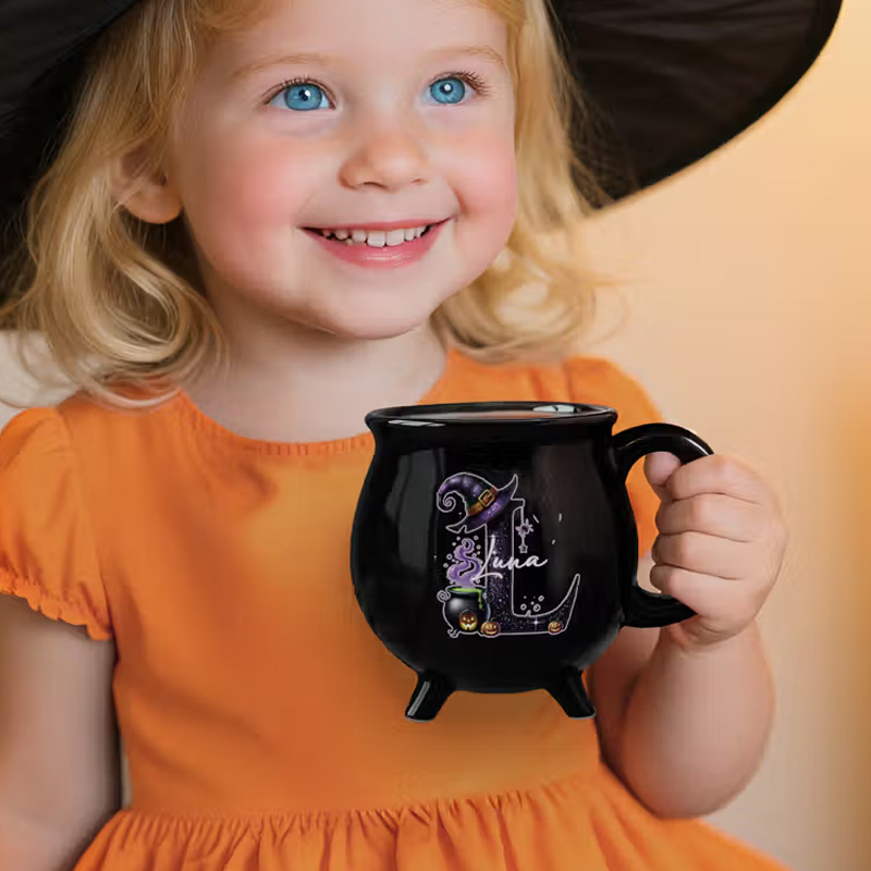Personalized Magic Pot and Witch Hat Glitter Initial Black Cauldron Ceramic Coffee Mug with Name Trick or Treat Halloween Party Gift for Women Kids