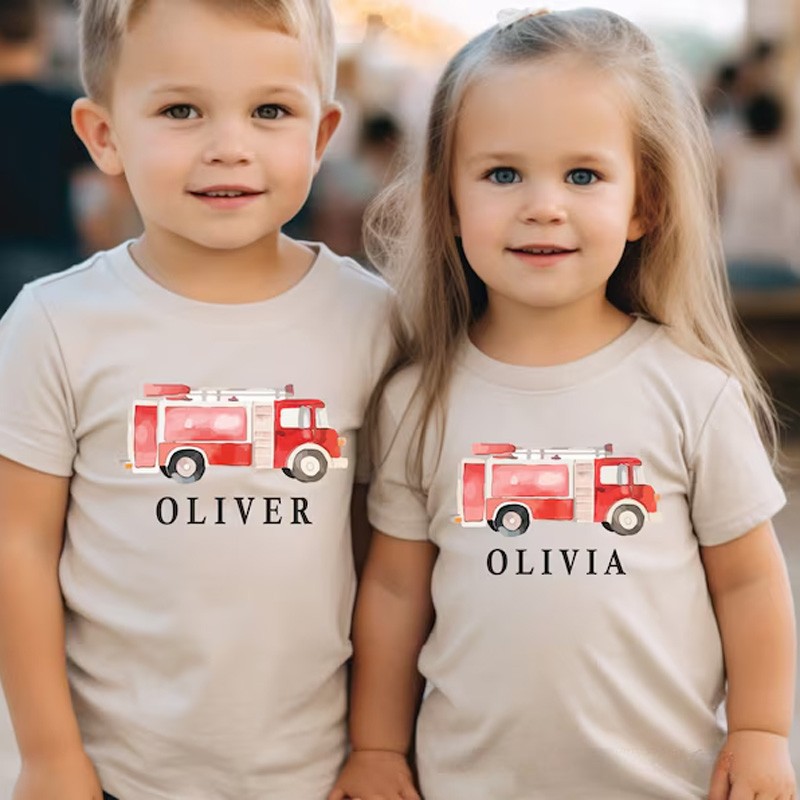 Personalized Fire Truck Kids T-Shirt with Custom Name and Adorable Red Fire Engine Graphic for Little Heroes Kids T-Shirt
