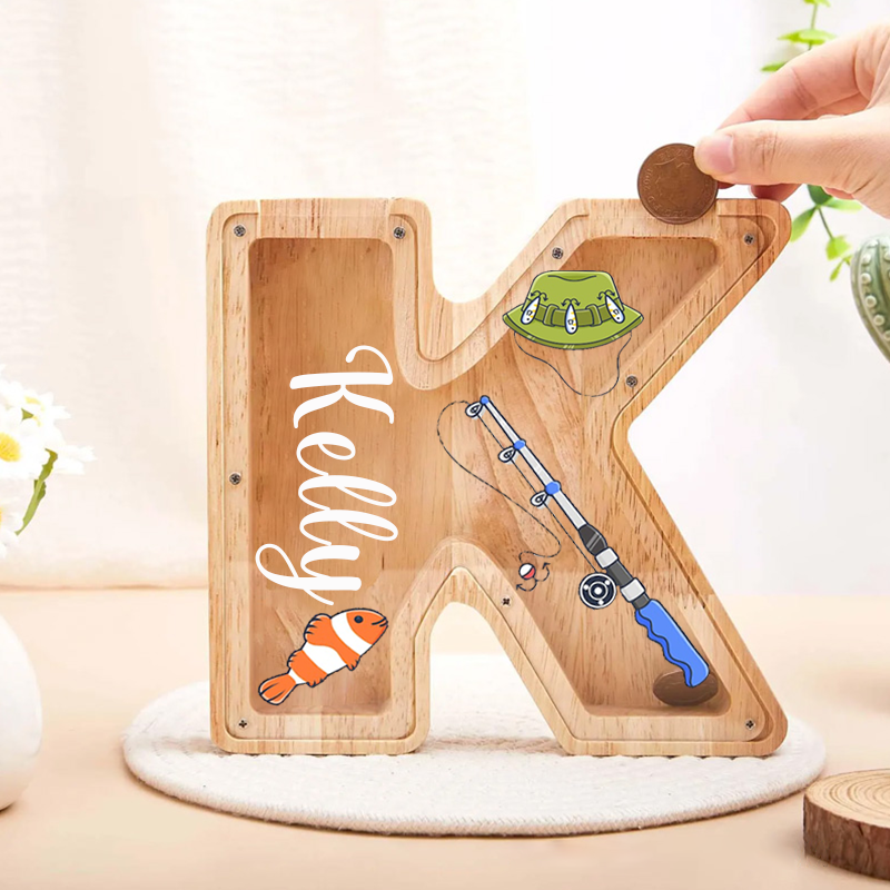 Personalized Fishing Themed Wooden Letter Piggy Bank Fun Fishing Hat Rod and Boat Design Custom Name Perfect Gift for Kids and Anglers
