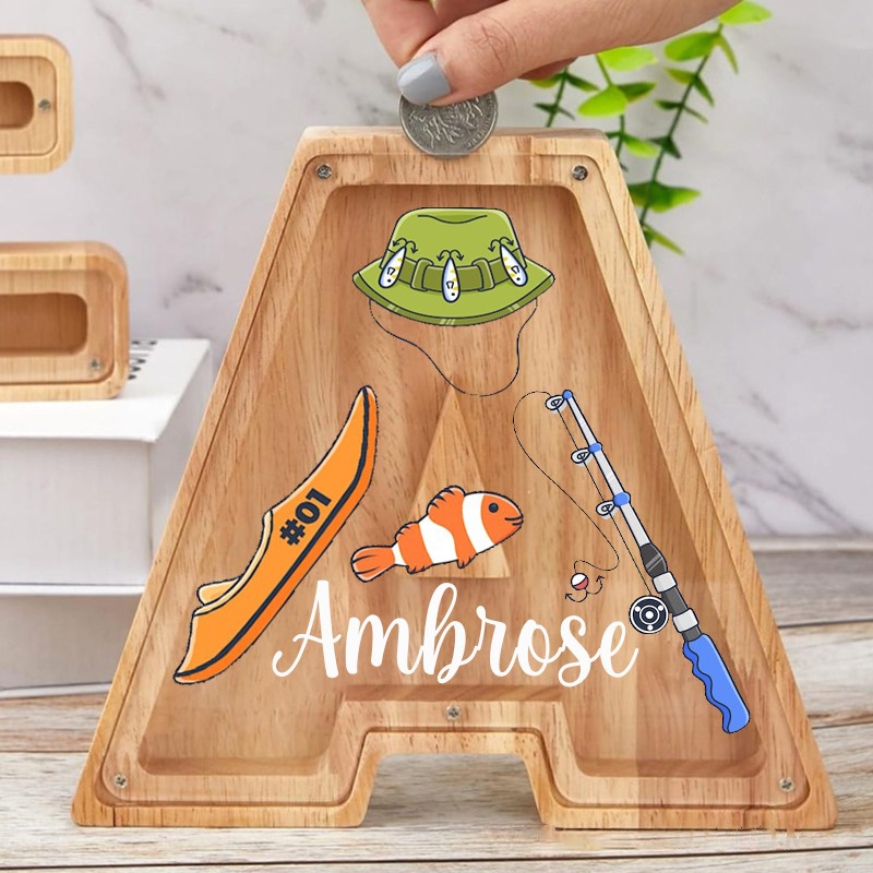 Personalized Fishing Themed Wooden Letter Piggy Bank Fun Fishing Hat Rod and Boat Design Custom Name Perfect Gift for Kids and Anglers