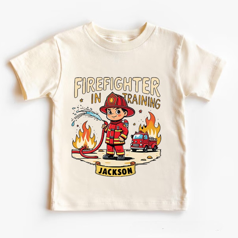 Personalized Firefighter in Training Kids T-Shirt with Custom Name and Cute Cartoon Firefighter Graphic for Aspiring Heroes Kids T-Shirt
