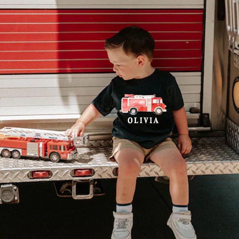 Personalized Fire Truck Kids T-Shirt with Custom Name and Adorable Red Fire Engine Graphic for Little Heroes Kids T-Shirt