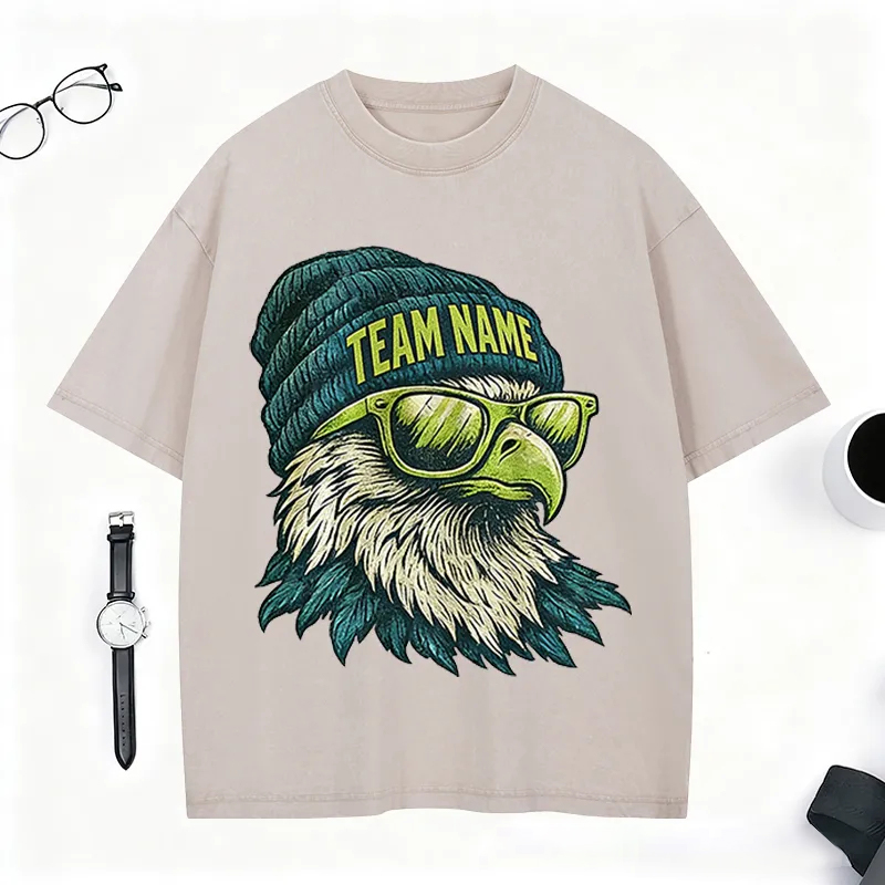 Personalized Football Mascot Washed T-Shirt with Beanie-Wearing Eagle and Custom Team Name for Football Enthusiasts