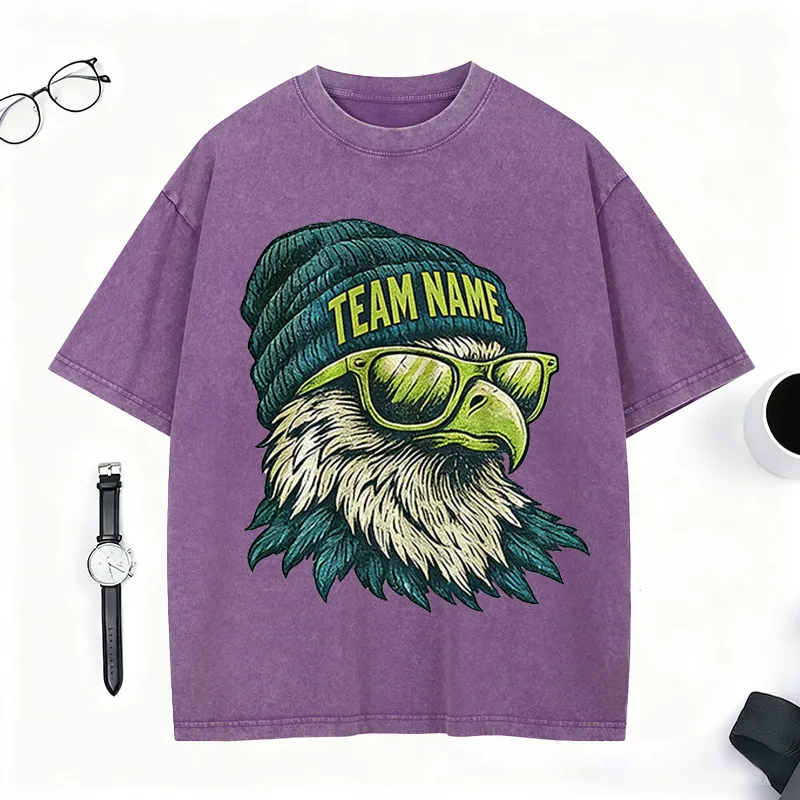 Personalized Football Mascot Washed T-Shirt with Beanie-Wearing Eagle and Custom Team Name for Football Enthusiasts
