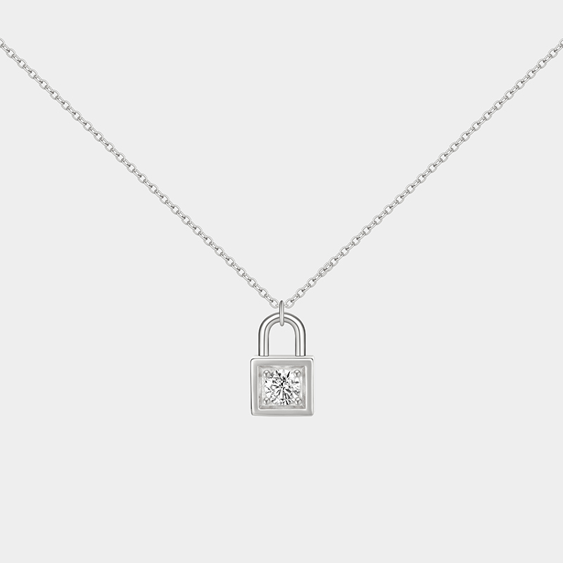 Personalized sterling silver lock necklace – customizable with engraving and a birthstone pendant.