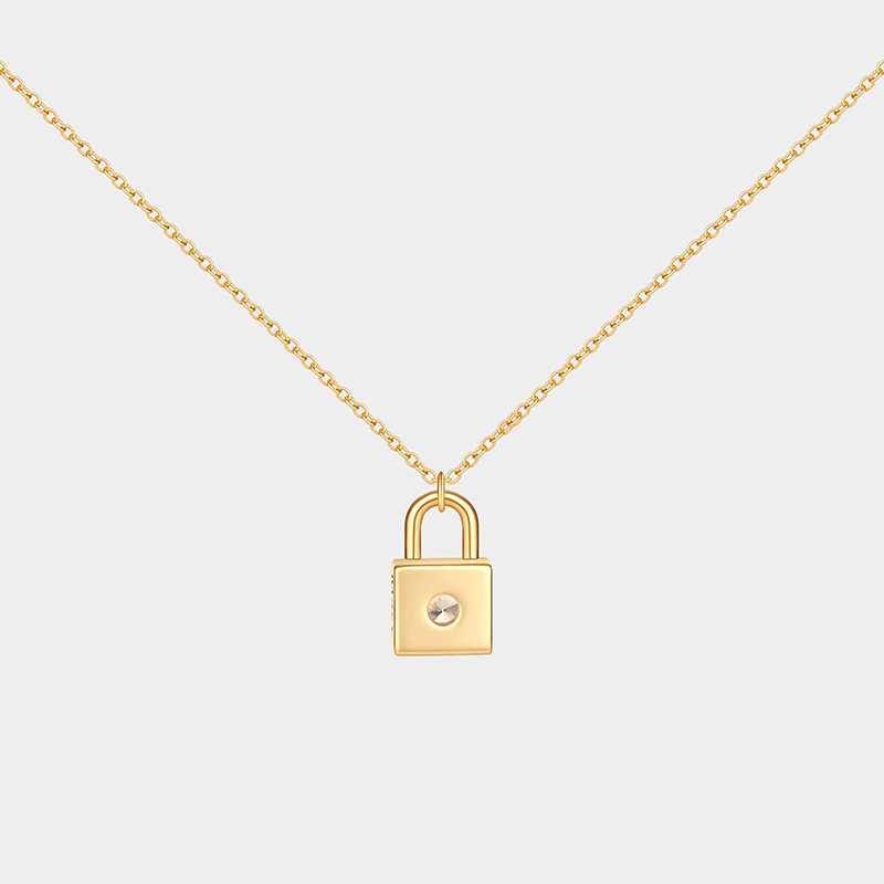 Personalized sterling silver lock necklace – customizable with engraving and a birthstone pendant.