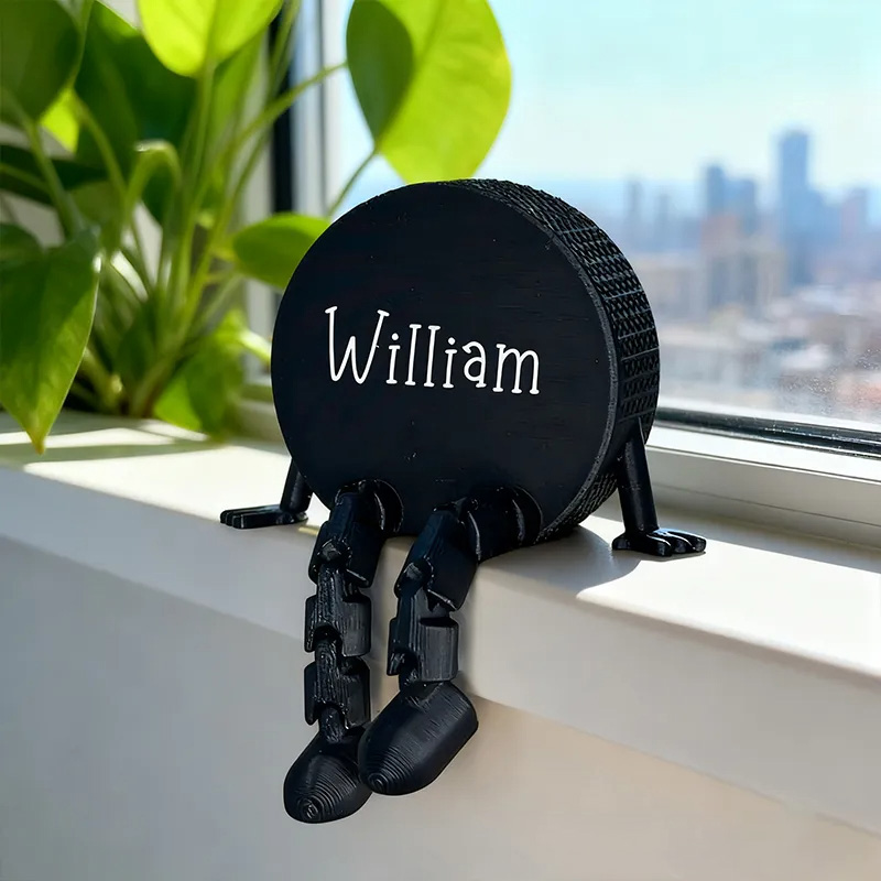 Personalized Hockey Puck Decor with Dangling Legs and Custom Name