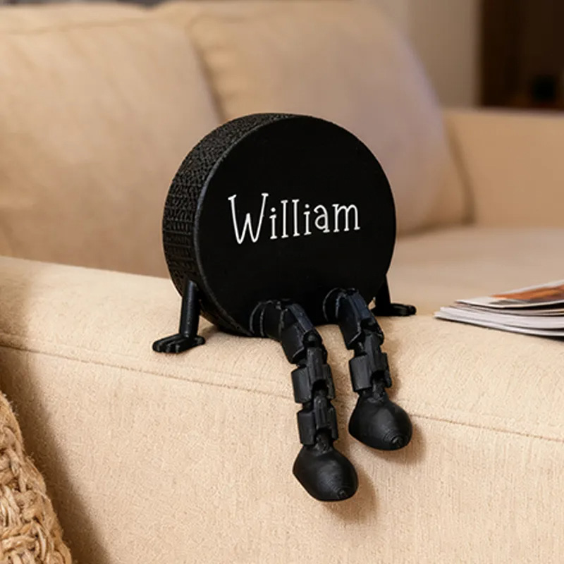 Personalized Hockey Puck Decor with Dangling Legs and Custom Name