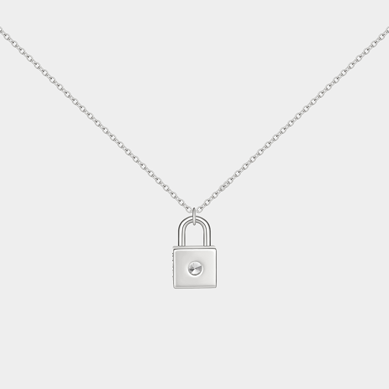 Personalized sterling silver lock necklace – customizable with engraving and a birthstone pendant.