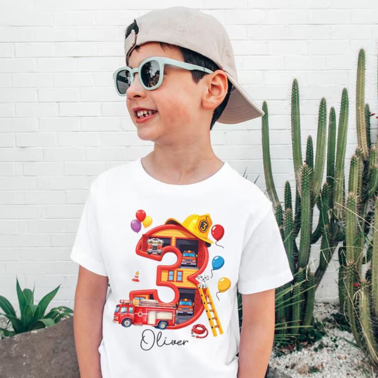 Personalized Fire Truck Birthday Kids T-Shirt with Custom Name and Colorful Birth Number Three Graphic for Celebrating Little Heroes Kids T-Shirt