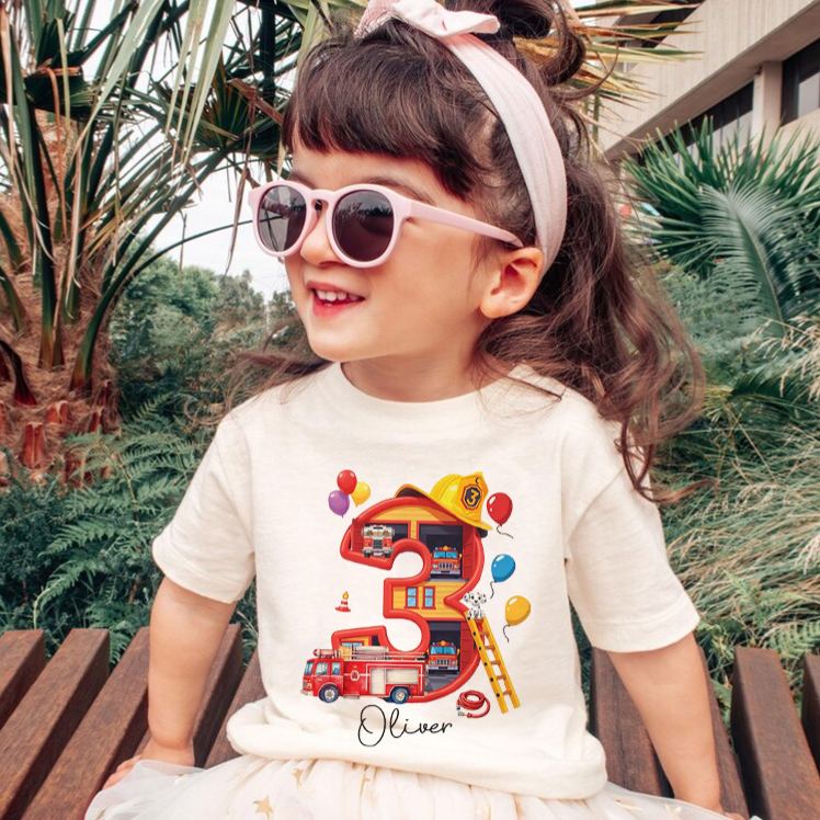 Personalized Fire Truck Birthday Kids T-Shirt with Custom Name and Colorful Birth Number Three Graphic for Celebrating Little Heroes Kids T-Shirt