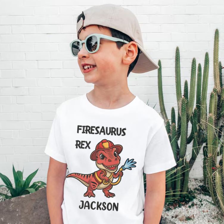 Personalized Dinosaur Firefighter Kids T-Shirt with Adorable Firesaurus Rex Graphic and Custom Name for Fun Adventures Kids T-Shirt
