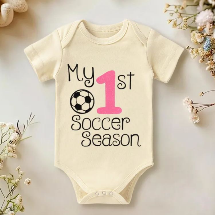 Personalized Baby Onesie with Soccer Ball and Number Motif Design Symbolizing Growth and Special First Milestones
