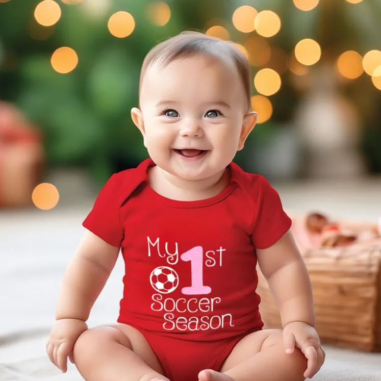 Personalized Baby Onesie with Soccer Ball and Number Motif Design Symbolizing Growth and Special First Milestones