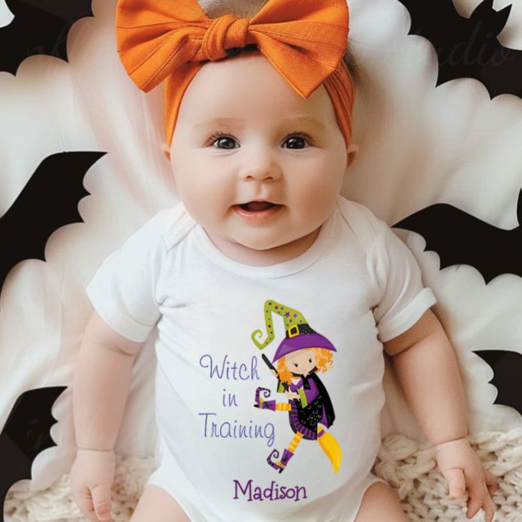 Personalized Witch in Training Featuring Adorable Witch Motif and Customizable Name for Baby’s Halloween Celebration Baby Onesie