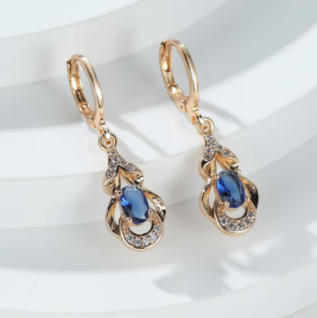 👉 Темпераментни и елегантни овални геометрични обеци в цвят шампанско злато