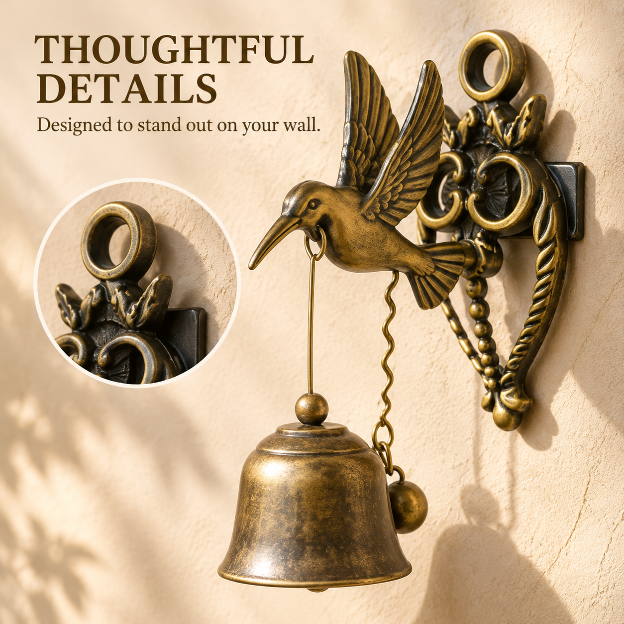 Close-up of ornate antique-inspired bird bell bracket, decorative loop and aged metal finish