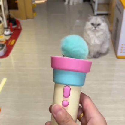 Electric cat toy launcher - launches pom-pom toy