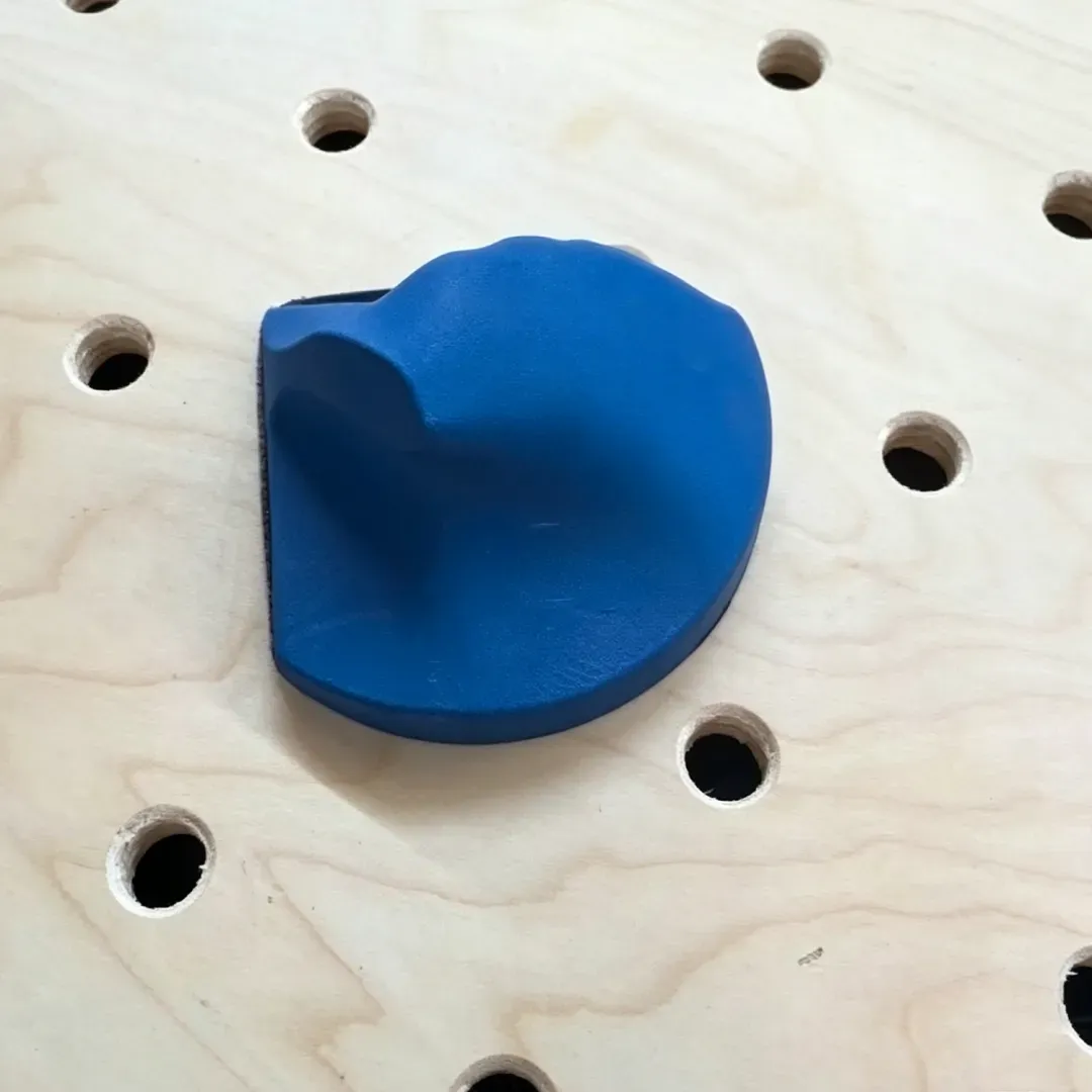 Palm-fitting sanding block