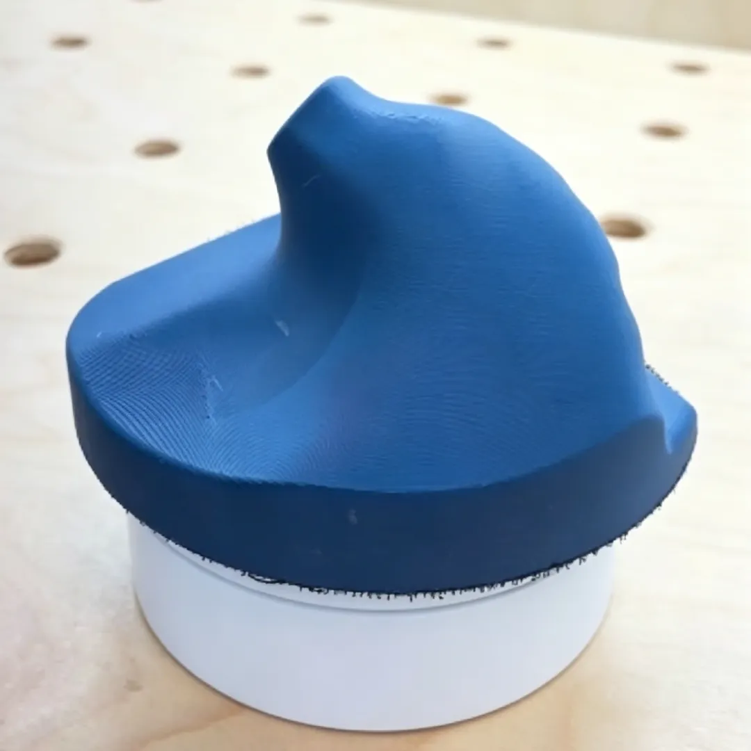 Palm-fitting sanding block
