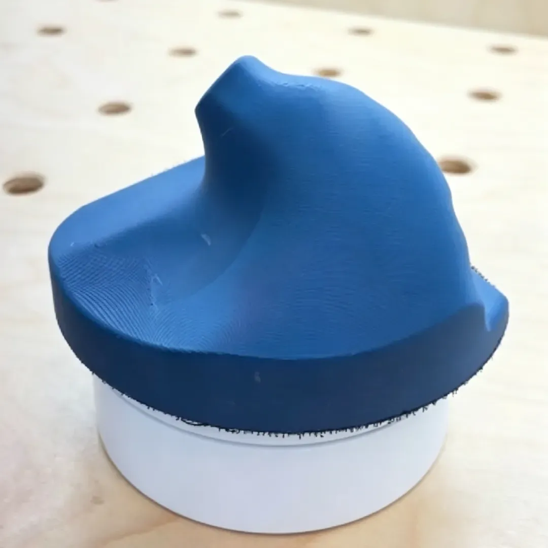 Palm-fitting sanding block