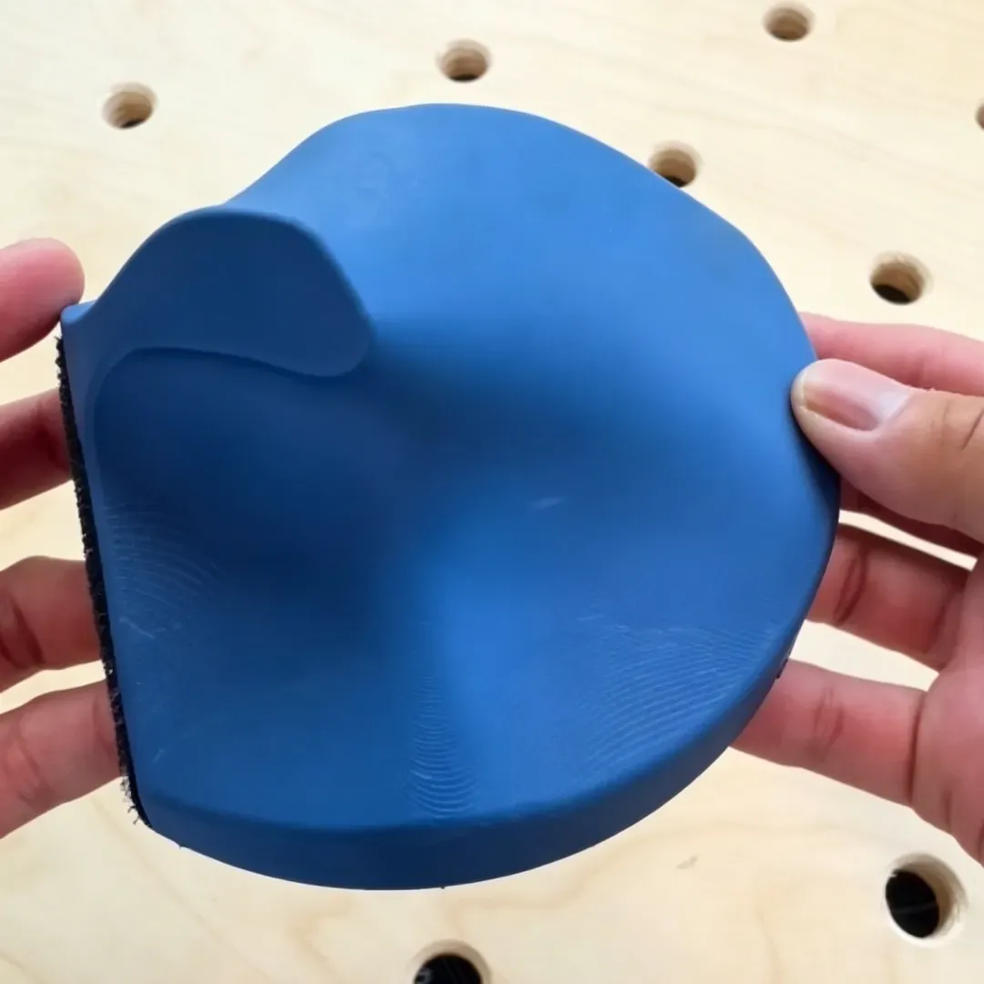Palm-fitting sanding block