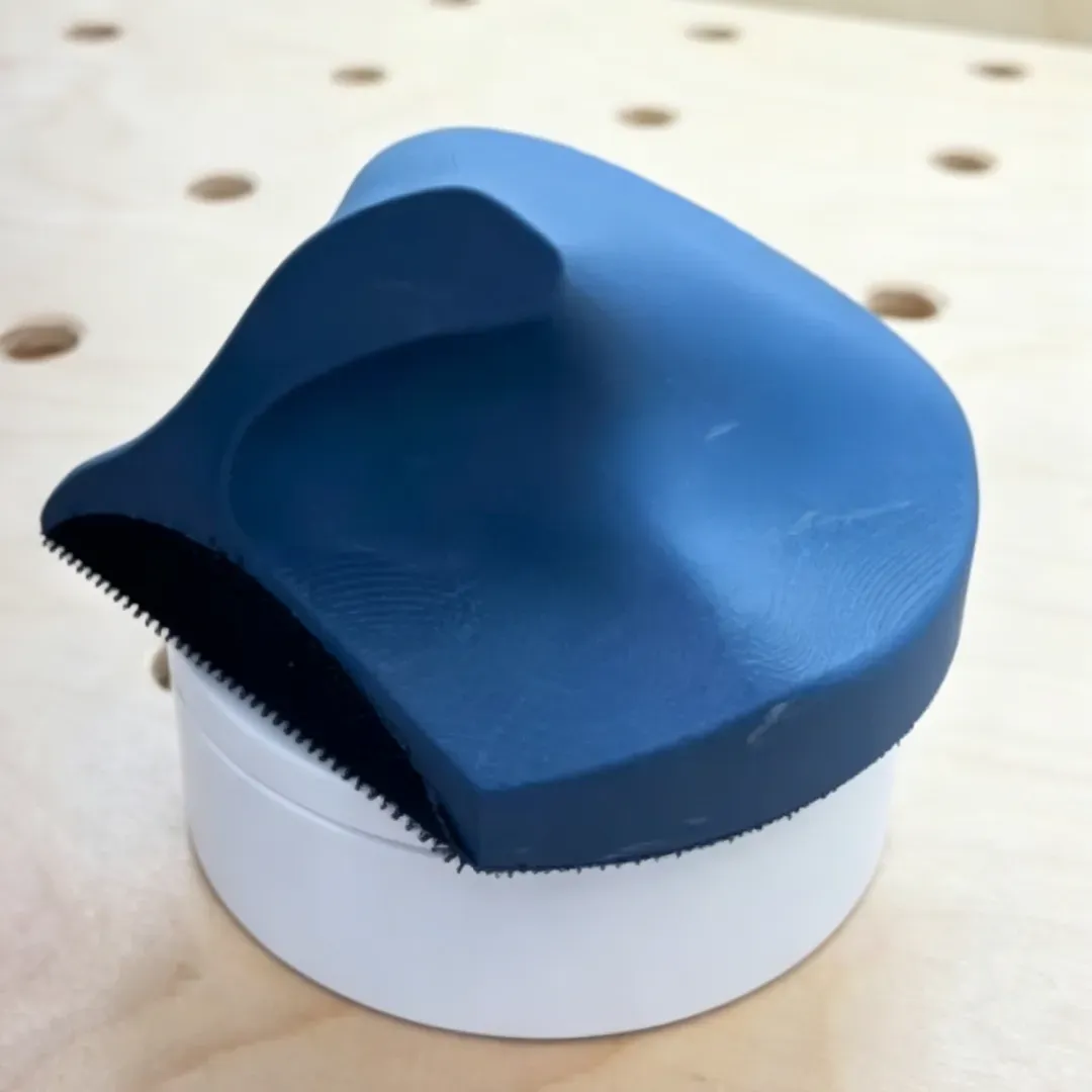 Palm-fitting sanding block