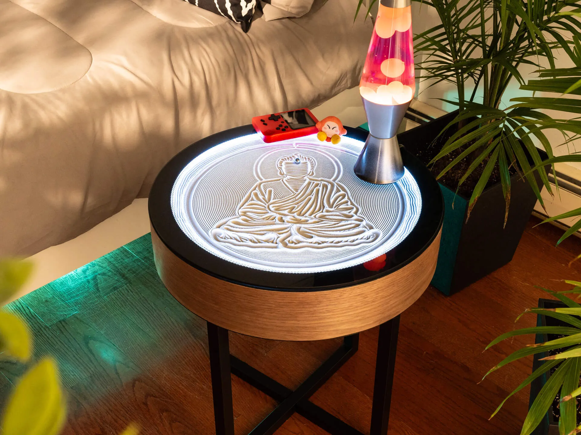 Kinetic sand art side table in a bedroom