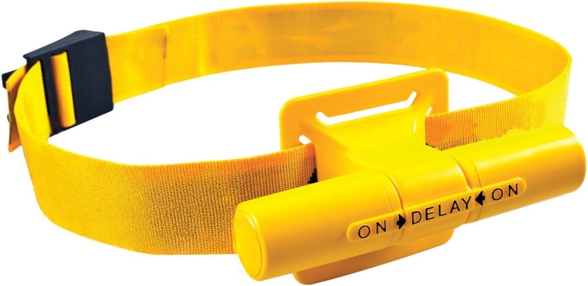 Audible hip rotation swimming training aid