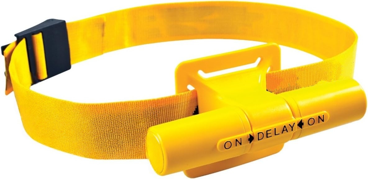 Audible hip rotation swimming training aid
