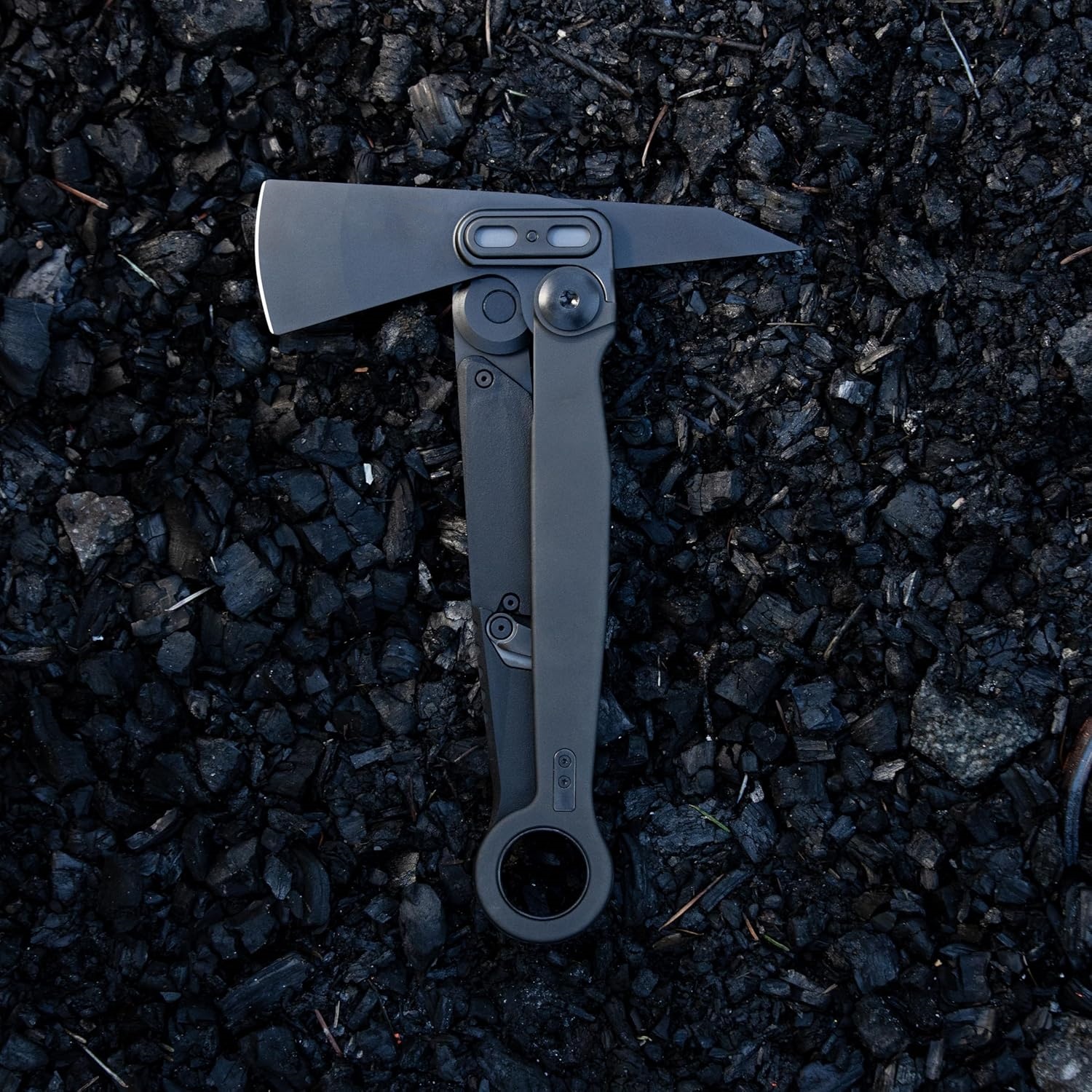 Compact black folding axe with a deadbolt lock