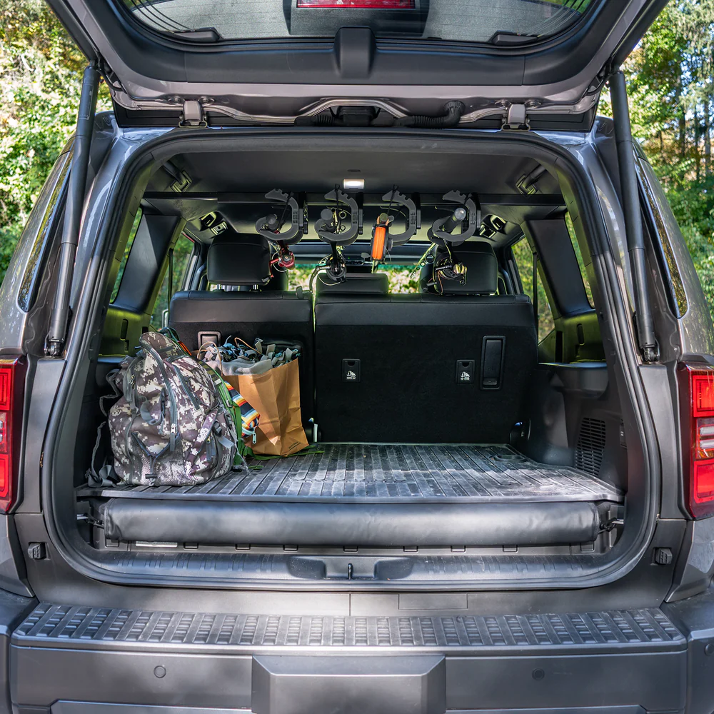 In-vehicle fishing rod storage rack