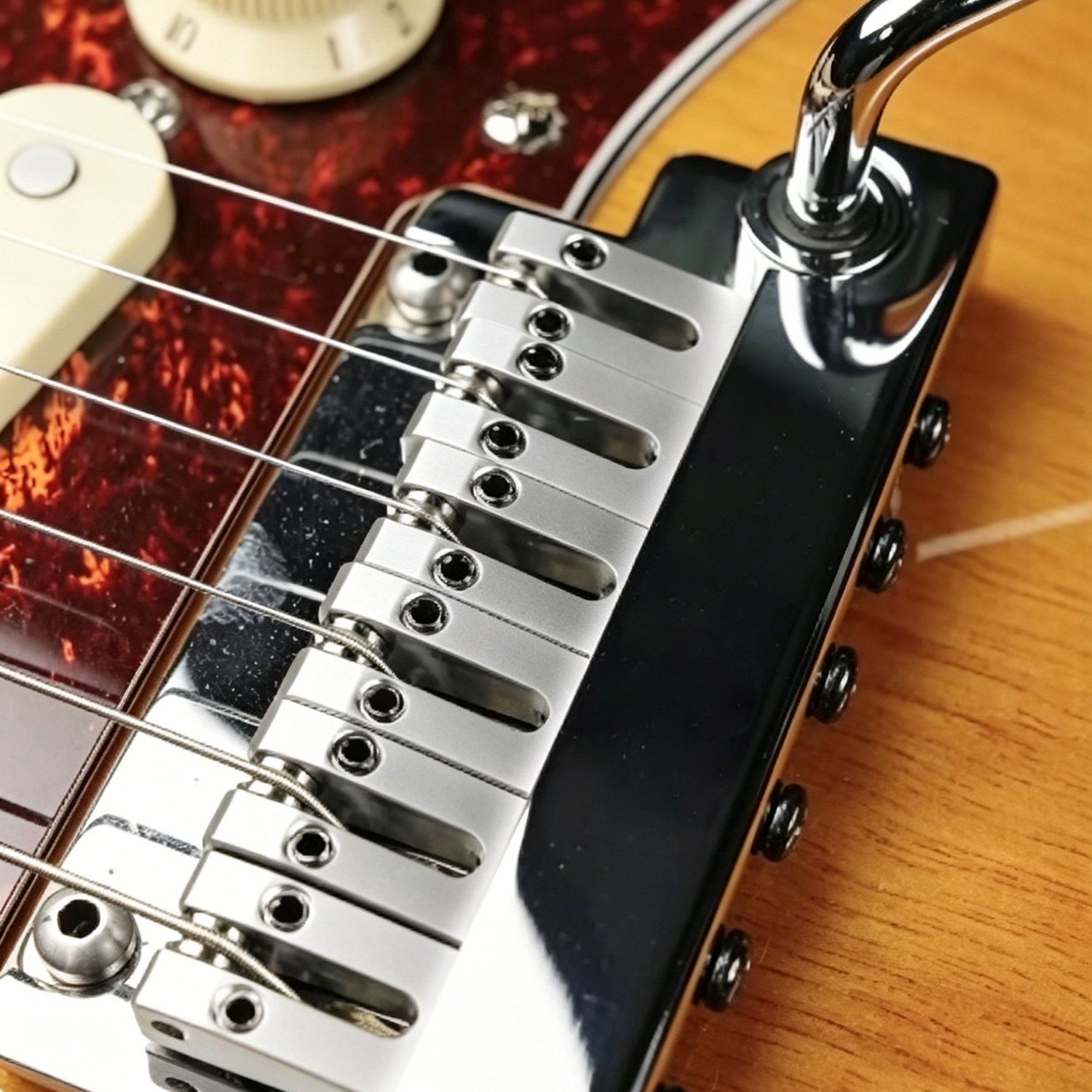 Plug-in guitar tremolo bridge