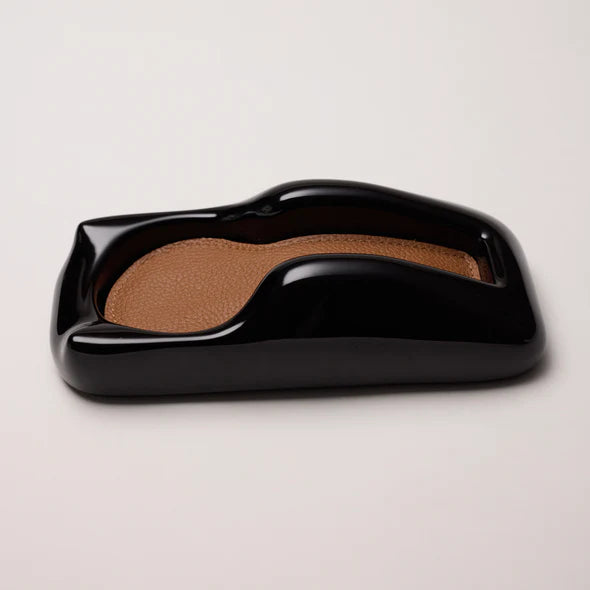 The watch stand is made of solid aluminum