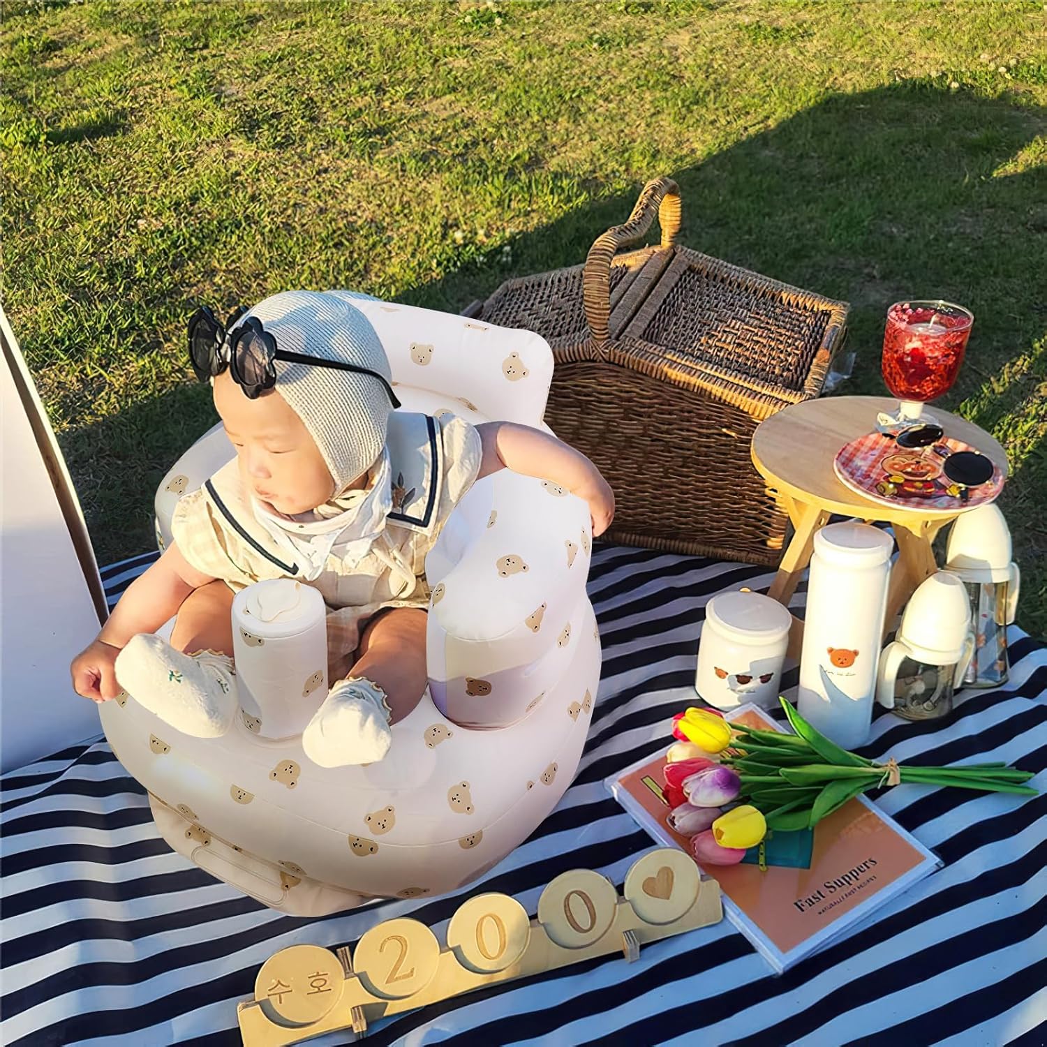 Infant inflatable seat with suction cup and built-in air pump